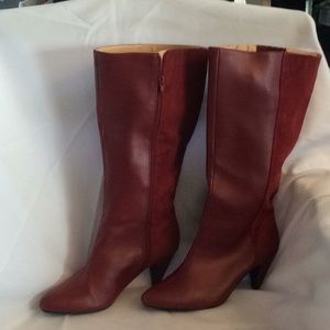 Knee length red boots